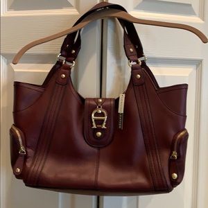 Etienne Aigner 100% leather burgundy/wine handbag